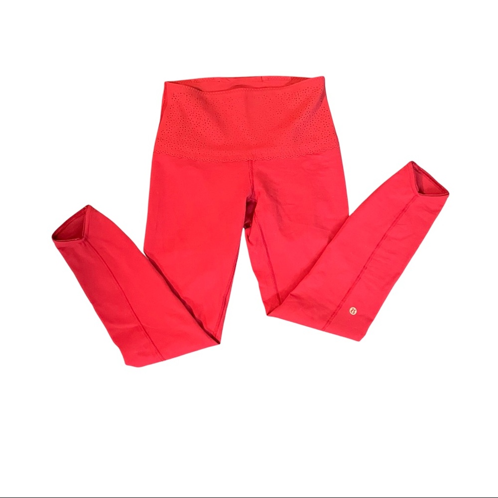 Eyelet waist red leggings